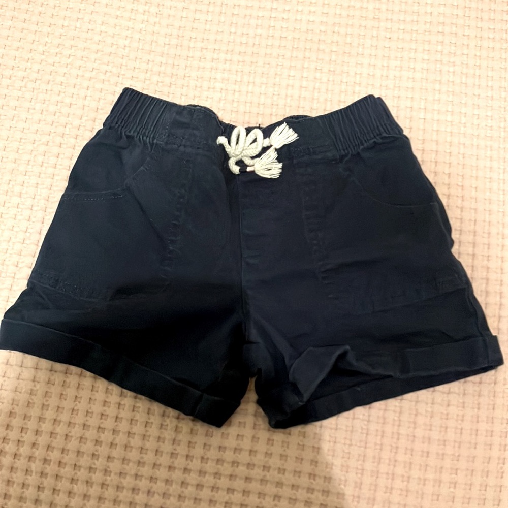 Comfy blue shorts and white tie!